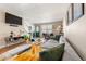 Inviting living room showcasing a large sectional sofa, hardwood floors, and bright decor at 338 Pheasant Run, Louisville, CO 80027