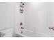 Clean, tiled shower and bathtub area at 690 W 172Nd Pl, Broomfield, CO 80023