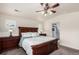 Inviting main bedroom with luxurious bedding and an attached bathroom at 690 W 172Nd Pl, Broomfield, CO 80023