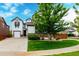 Charming two-story home featuring a well-manicured lawn and inviting curb appeal at 690 W 172Nd Pl, Broomfield, CO 80023