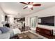 Open-concept living room featuring a comfortable couch with seamless transition to kitchen and dining area at 690 W 172Nd Pl, Broomfield, CO 80023