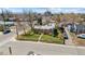 Charming single-story brick home with well-maintained lawn, and manicured landscaping at 1299 S Dale Ct, Denver, CO 80219