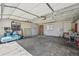 Unfinished garage interior; suitable for workshop with a variety of tools at 1299 S Dale Ct, Denver, CO 80219