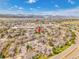 Elevated shot of property highlights its desirable location within a lush neighborhood with scenic mountain views in the distance at 9658 W Chatfield Ave # D, Littleton, CO 80128
