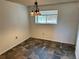 Cozy dining area with tiled floors and a charming chandelier lighting fixture at 12452 W Dumbarton Pl, Morrison, CO 80465