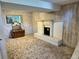 Basement living room area with decorative fireplace at 12452 W Dumbarton Pl, Morrison, CO 80465
