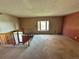 Cozy living room with large window providing natural light at 12452 W Dumbarton Pl, Morrison, CO 80465