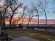 Fenced backyard with brick retaining wall shows space for outdoor activities and a relaxing atmosphere at 9025 Jellison Ct, Broomfield, CO 80021