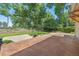 Expansive backyard with lush landscaping and mature trees offers a private retreat at 9025 Jellison Ct, Broomfield, CO 80021