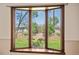 Picturesque bay window offers views of the beautifully landscaped backyard at 9025 Jellison Ct, Broomfield, CO 80021