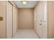 Bright foyer featuring tile flooring and closet for organized storage and a welcoming entrance at 9025 Jellison Ct, Broomfield, CO 80021