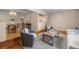 Bright living room featuring hardwood floors, vaulted ceilings and elegant decor at 9025 Jellison Ct, Broomfield, CO 80021