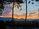 Picturesque sunset view overlooking the mountains and foliage at 9025 Jellison Ct, Broomfield, CO 80021