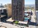 Towering brown high-rise building in an urban landscape with city views and a rooftop pool at 1020 15Th St # 20N, Denver, CO 80202