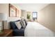 Bedroom with a plush bed, stylish decor, and natural light at 1020 15Th St # 20N, Denver, CO 80202