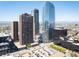 Panoramic cityscape view with modern architecture, skyscrapers, and the Rocky Mountains in the background at 1020 15Th St # 20N, Denver, CO 80202