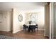 Bright dining room with wood floors, table with decor and seating for four at 1020 15Th St # 20N, Denver, CO 80202
