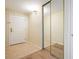 Entryway with mirror closet door and ceramic tile/wood flooring at 1020 15Th St # 20N, Denver, CO 80202