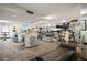Spacious gym featuring treadmills, weight machines, cable machines, and mirrored walls with natural light at 1020 15Th St # 20N, Denver, CO 80202