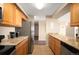 Open kitchen featuring stainless steel appliances and granite countertops at 1020 15Th St # 20N, Denver, CO 80202