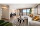 Inviting living room with hardwood floors, balcony access with city views, and modern decor at 1020 15Th St # 20N, Denver, CO 80202