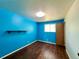 Inviting bedroom with hardwood floors, a window, and a clean design, perfect for relaxation and rest at 7245 S Dexter St, Centennial, CO 80122