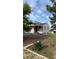 Inviting one-story home with neat landscaping and a well-kept lawn at 5030 Beach Ct, Denver, CO 80221