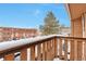 Private balcony with snowy view of surrounding buildings at 9105 Oberon Rd # 2, Arvada, CO 80004