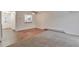 Bright living room with wood-look floors and kitchen pass-through at 9105 Oberon Rd # 2, Arvada, CO 80004