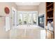 Bright bathroom with large tub, picturesque windows and fireplace at 4491 Shoshone Dr, Larkspur, CO 80118