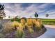 Community park featuring a playground, tall grasses and scenic views under a partly cloudy sky at 7888 E 139Th Pl, Brighton, CO 80602