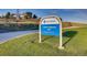 Quebec Highlands Park sign with hours and park amenities in the City of Thornton at 7888 E 139Th Pl, Brighton, CO 80602