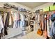 Walk-in closet with ample storage on multiple shelves and rods for organizing clothes at 7888 E 139Th Pl, Brighton, CO 80602