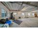 Spacious unfinished basement with bright windows and a fitness area, offering great potential at 1087 E Hopkins Dr, Elizabeth, CO 80107