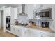 Stylish kitchen with granite countertops and stainless-steel appliances at 1087 E Hopkins Dr, Elizabeth, CO 80107