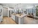 Open-concept kitchen flows into living area, perfect for entertaining at 1087 E Hopkins Dr, Elizabeth, CO 80107