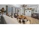 Stylish living room featuring neutral decor, comfortable seating, and a decorative built-in at 1087 E Hopkins Dr, Elizabeth, CO 80107