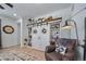 Living room features custom shelving and cozy leather armchair at 1087 E Hopkins Dr, Elizabeth, CO 80107