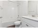 Bright bathroom with tile surround bathtub and a white single sink at 6804 Merseyside Ln, Castle Pines, CO 80108