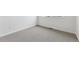 Bedroom features neutral carpet, white trim, and a window at 6804 Merseyside Ln, Castle Pines, CO 80108