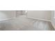 View of spacious carpeted basement with neutral gray walls and white trim, providing a clean and modern aesthetic at 5905 S Platte Canyon Dr, Littleton, CO 80123
