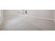 View of spacious carpeted basement with staircase and window, neutral gray walls, and white trim at 5905 S Platte Canyon Dr, Littleton, CO 80123