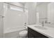 Full bathroom with shower over tub, and single sink vanity at 5905 S Platte Canyon Dr, Littleton, CO 80123