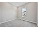 Neutral bedroom with carpet and natural light at 5905 S Platte Canyon Dr, Littleton, CO 80123