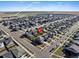 Aerial view of a neighborhood showing the proximity to a school at 26909 E Cedar Ave, Aurora, CO 80018