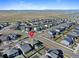 Aerial view of a quiet neighborhood, highlighting the property's location at 26909 E Cedar Ave, Aurora, CO 80018