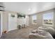 Bedroom includes bean bag chairs and mounted TV perfect for entertainment at 26909 E Cedar Ave, Aurora, CO 80018