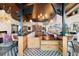 Chic clubhouse with a contemporary bar area, multiple TVs, and stylish seating perfect for socializing and relaxation at 26909 E Cedar Ave, Aurora, CO 80018