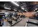 Community gym featuring treadmills, elliptical machines, and weights for residents at 26909 E Cedar Ave, Aurora, CO 80018