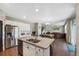 Bright kitchen seamlessly connects to the cozy living room, perfect for entertaining and enjoying open concept living at 26909 E Cedar Ave, Aurora, CO 80018